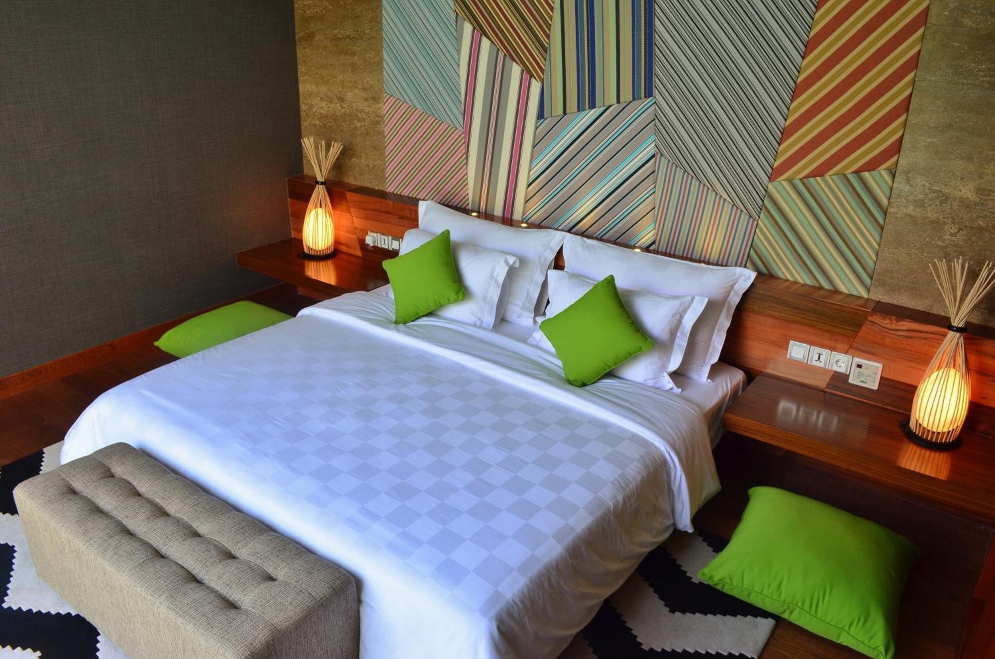 Ts Suites Seminyak Quarto foto A bedroom at the hotel