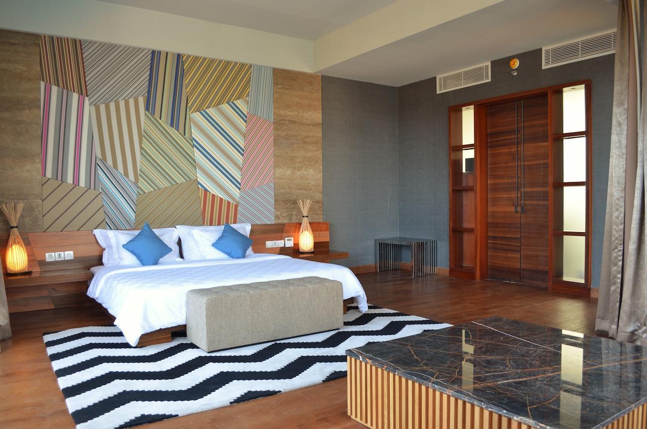 Ts Suites Seminyak Quarto foto A bedroom at the hotel